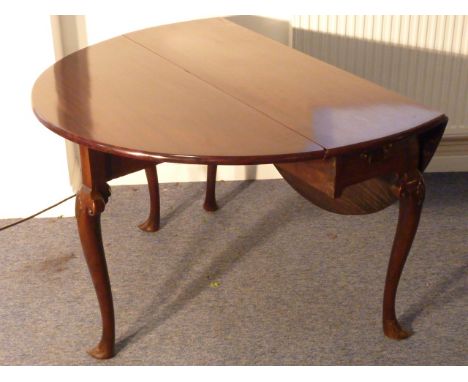 ADDED LOT    A good mid 18th Century mahogany (probably Cuban) oval drop leaf gate leg Table, single frieze drawer and raised