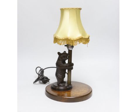 A Black Forest 'bear' table lamp, 36cm including shade