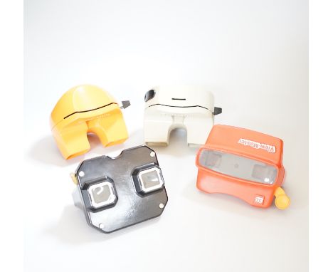 Fifteen View-Master viewers, including five ‘Model K’ viewers, in red and orange, together with a small quantity of reels wit