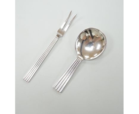 A Georg Jensen sterling christening spoon and fork set, 1945-1951 Sigvard Bernadotte design, not import marked, with associat