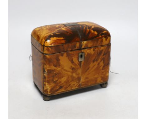 A George III tortoiseshell tea caddy with white metal mounts, 15cm wide