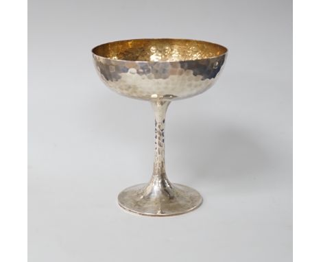 An Edwardian planished silver champagne coupe, makers Mappin &amp; Webb, London 1903, 145 grams