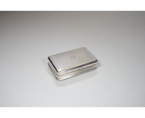 A George III engine turned rectangular silver snuff box, with later internal presentation inscription, Birmingham 1817, 7.25c