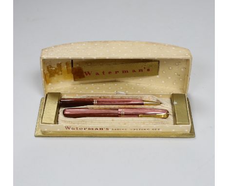 A boxed Waterman's pen and pencil Ladies Writing Set, comprising a pink striated model 512V and pencil in original card case