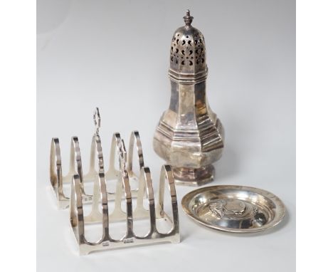 A George V octagonal silver caster, Sheffield 1932, 121 grams, a pair of Walker &amp; Hall toast racks, Birmingham 1921, 101 