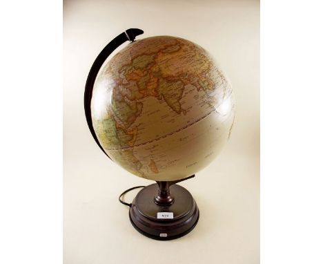 An illuminated globe on stand 