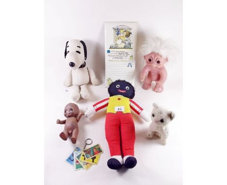 A group of vintage toys including Snoopy, Golly, Troll etc.