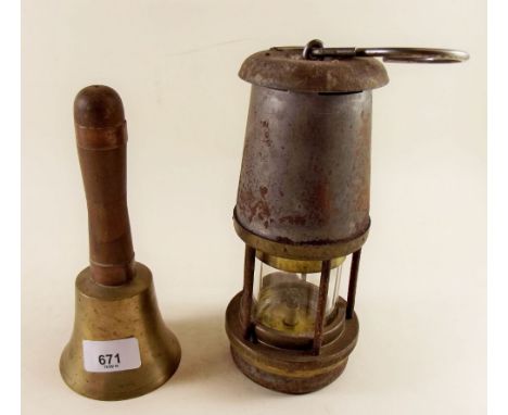 A Wolf safety mining lamp and a hand bell 