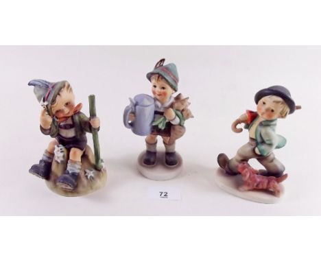 Three Hummel figures of boys 