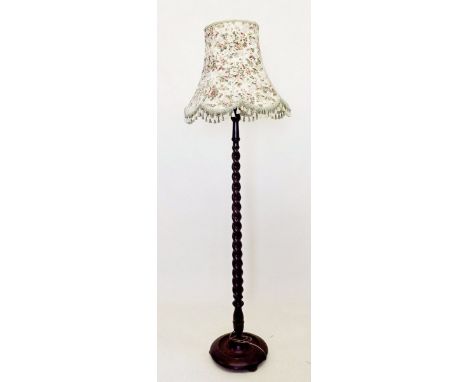An oak barleytwist standard lamp 