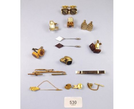 A box of cufflinks and tie pins 
