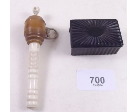 A Victorian papier mache snuff box and an Edwardian carved horn and bone tape measure and needle case with stanhope finial