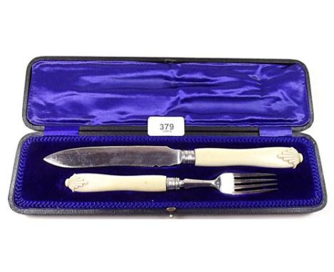 A silver and ivory cake knife and fork with ivory handles, Sheffield 1910 - cased 