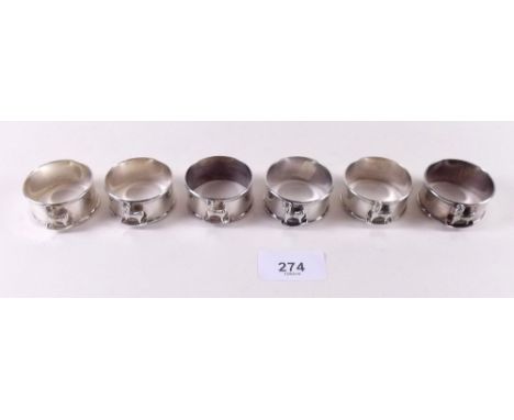 A set of six silver napkin rings with rocking horse motif - London 2008, 2.9ozs