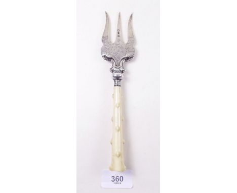 A silver toast fork with ivory 'mutton fat' handle - London 1899