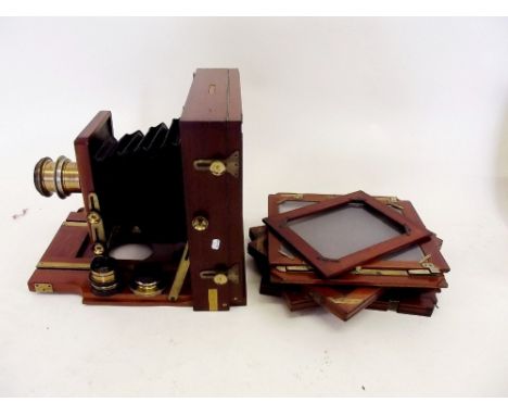 A J Lancaster mahogany folding plate camera plus 3 lenses and plates all in canvas bag