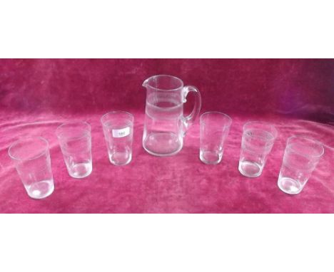 A vintage lemonade jug and six tumblers