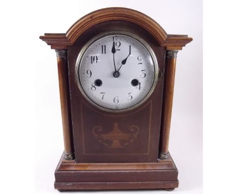 An Edwardian mahogany inlaid mantel clock 