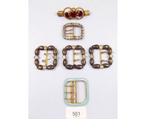 A box of enamel and diamonte buckles 