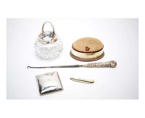 A silver mounted cut glass preserve pot; a silver mounted pin cushion; a silver cigarette case; a mother of pearl handed silv