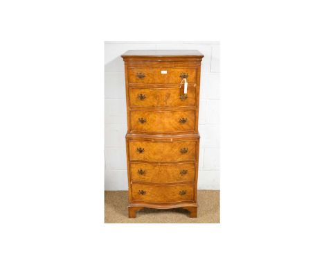 An attractive Georgian-style burr walnut serpentine front chest-on-chest, the moulded top above six long graduated drawers, o