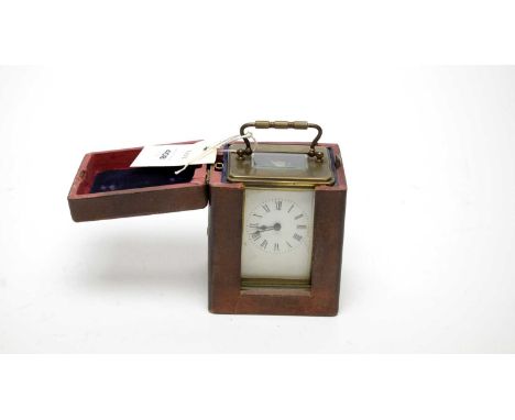 A 19th Century French brass cased carriage clock, the Roman dial with numerals in black, platform lever escapement, 15cms hig