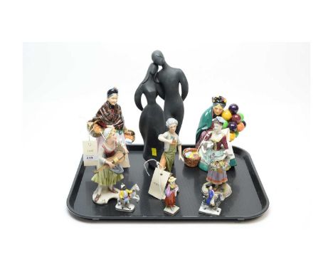 A selection of Royal Doulton figures, including: ‘Lovers’ HN2763; ‘The Orange Lady’ HN1759; and ‘The Old Balloon Seller’ HN13