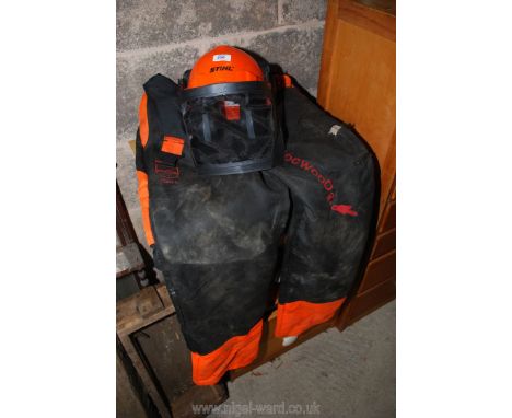 Stihl safety helmet and chainsaw trousers, size XL, small rips..