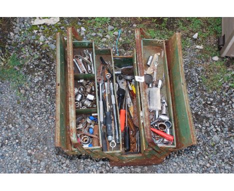 A metal cantilever tool box, sockets, spanners, tools, etc.,