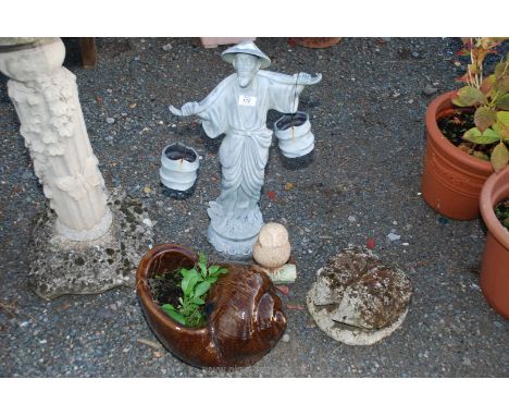 Resin figure of a Japanese water carrier and a glazed snail shell planter etc