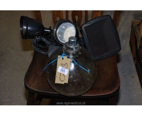 Two solar spot lights and an oil burner/light.
