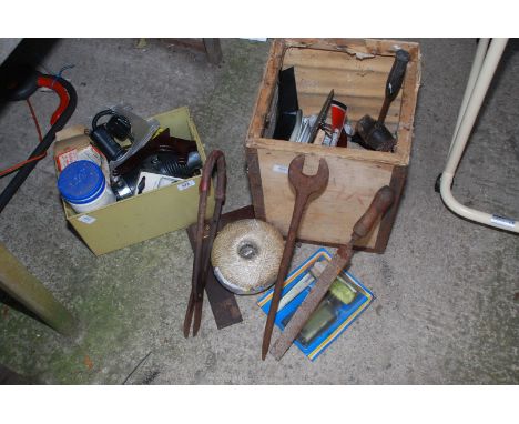 A hairdryer, plate stands, Aladdin wick, old tools etc.