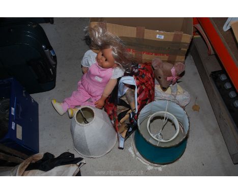 A doll, yarn, lamp shades etc