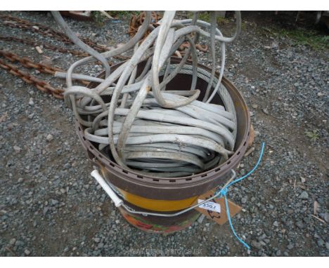 A tub, contents to include a bulb planter, pincers, electrical cable, a short piece of wire rope, etc.,