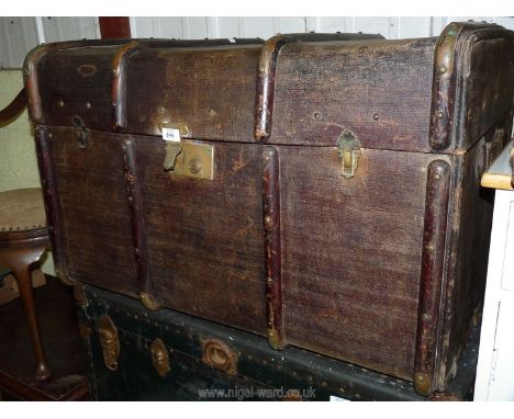 A bentwood bound canvas covered steamer trunk. 36" L x 22" D x 22" H.