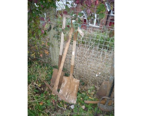 A spade, a shovel and a pick-axe.