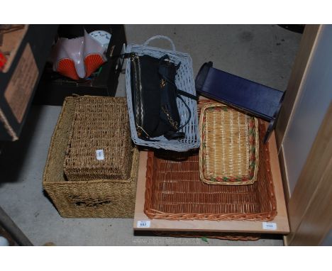 A quantity of wicker baskets, handbags, book trough etc