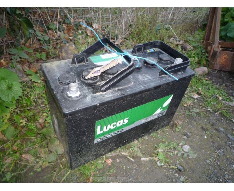 A 12 volt Lucas tractor battery.