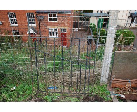 A metal gate 33" x 36" plus another 42" x 49".