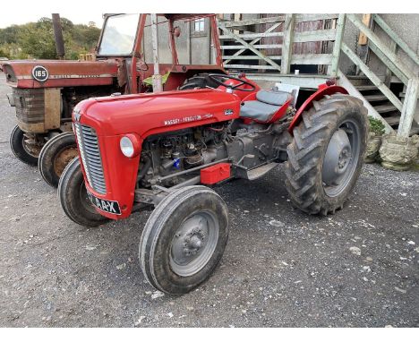 A Massey Ferguson 35 petrol/T.V.O. farm tractor bearing the registration number 627 AAX, Serial Number: SKM 199233 and accord