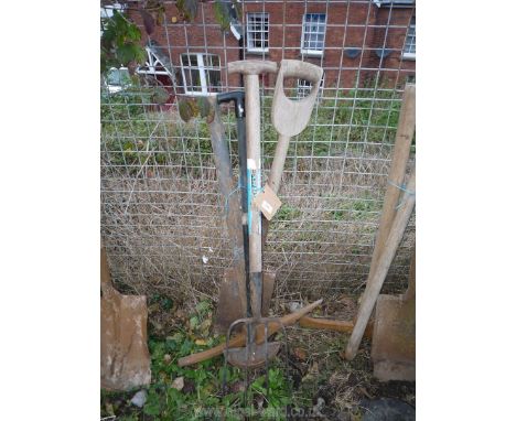 A spade, a fork, an edging iron and a pick-axe.