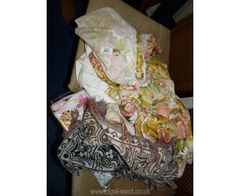 A quantity of linen, curtains, throws etc. Floral curtains 46" W x 54" D.