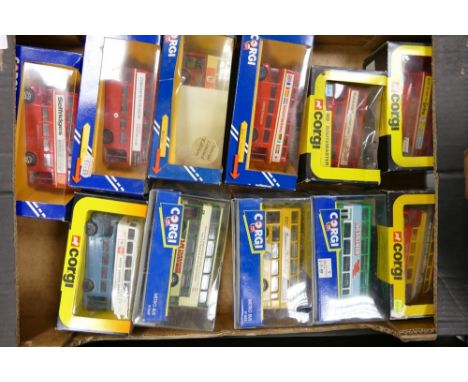 A collection of Boxed Corgi Model Buses including Open Top Route Master, Metrobus,469 Routemaster, Metro Bus91846, Metro Bus 