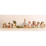 A collection of Beswick & Royal Albert Beatrix Potter figures to include - Mrs Tittlemouse (2a),