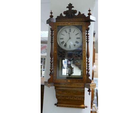 19th Century Inlaid Vienna Wall Clock. Geometrical and Greek Key patterns throughout with carved foliate pediment. Height: ap