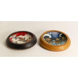 Two Moorcroft framed pin dishes in the Koi carp pattern and the other decorated with pirate boats.