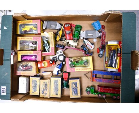 A collection of vintage toy cars to include Matchbox 1929 Bentley, 1911 T Ford, 1914 Stutz, 1912 Rolls Royce , 1907 Peugeot e