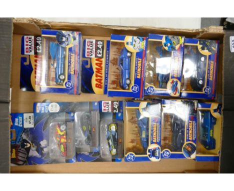 A collection of  Boxed Corgi &amp; Hotwheels 1:43th Scale Batman Die Cast Vehicles including Bat Marine, Bat Mobile, Bat Mobi