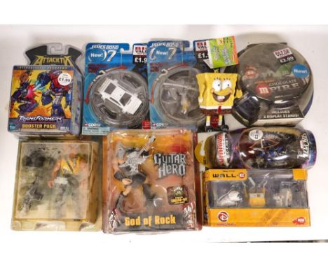 A mixed collection of Carded Figures &amp; Vehicles including Guitar Hero God of Rock, Disney Wall E , Marvel Legends Hawkeye