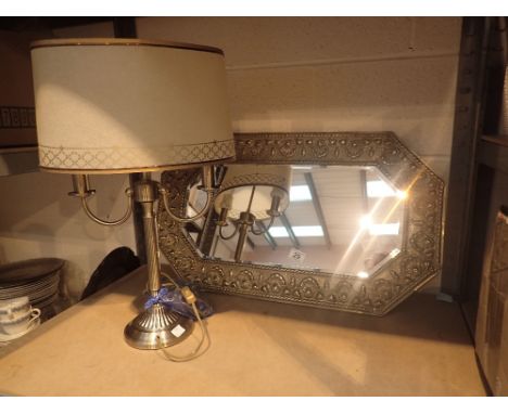 Brass framed bevel edged mirror and a brass table lamp